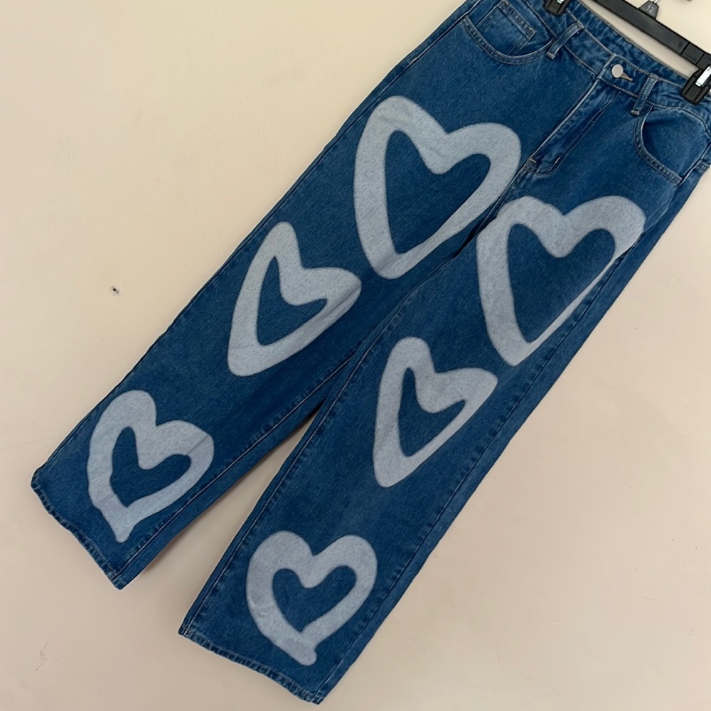 Trendy blue jeans with heart print